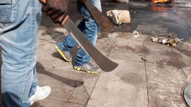 JUST IN: Residents Run For Their Lives As Cultists Butcher Security Guard, Another To Death