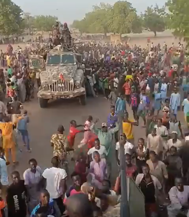 Video: Villagers welcome Nigerian soldiers back from successful operation