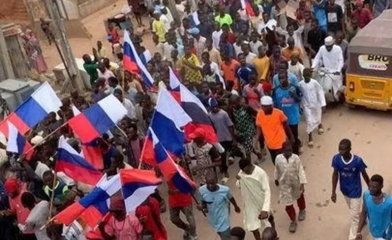 I Am Afraid- Ganduje's Ex-Aide Breaks Silence On Why Northern Youths Use Russian Flags To Protest Against Tinubu's Govt